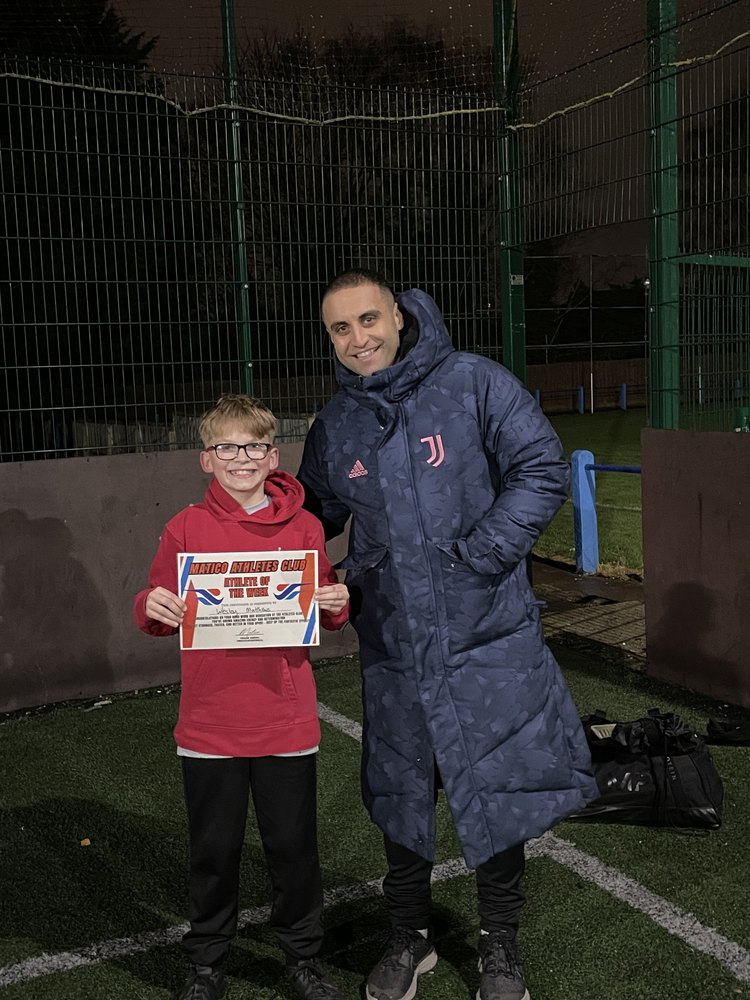 Coach Emeel with Zac, recognised at Matico Athletes Club