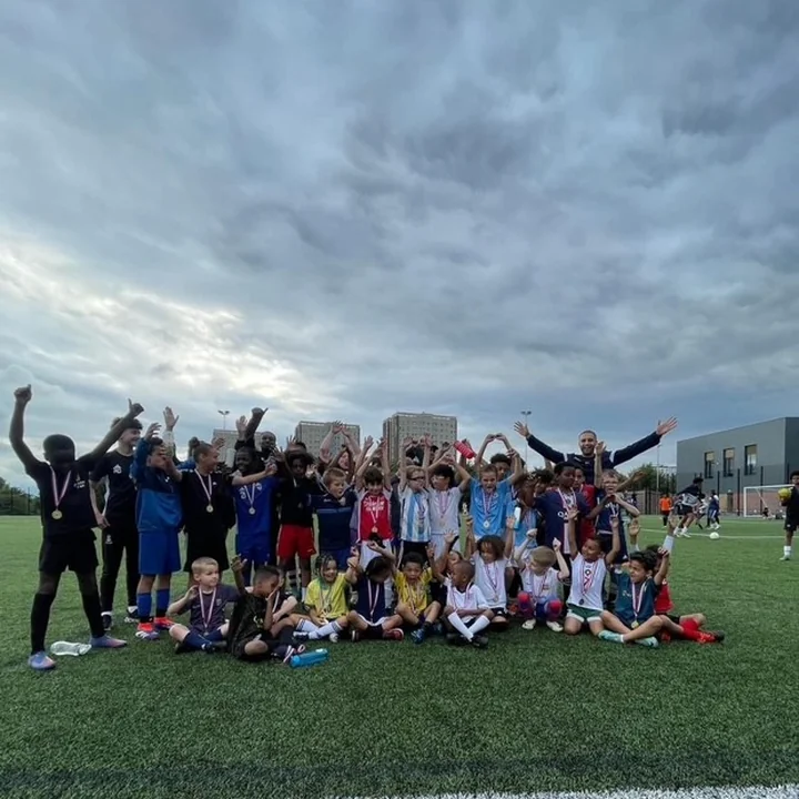 Matico residential camp team celebration with medals