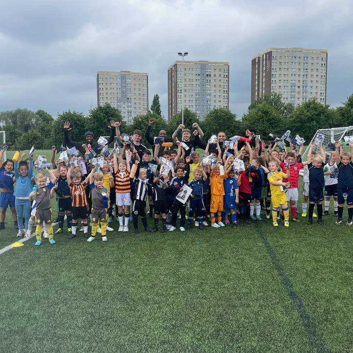 Matico players posing as a squad after training